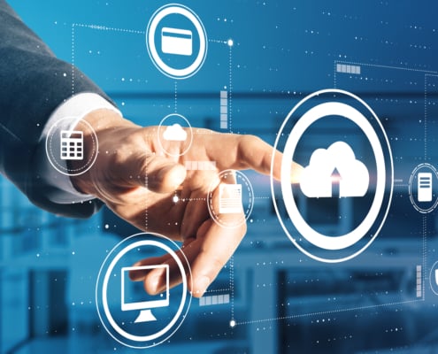 Business professional interacting with cloud computing and IT infrastructure icons representing fully managed IT services, data backup, cybersecurity, and cloud solutions