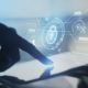 Hand using tablet with digital lock interface representing cybersecurity protection and data security