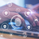 Fingerprint cybersecurity interface displaying endpoint detection and response technology protecting connected business devices and cloud systems