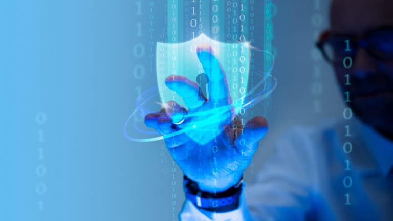 Close-up of a person interacting with a glowing digital security shield surrounded by binary code, representing cybersecurity and data protection.